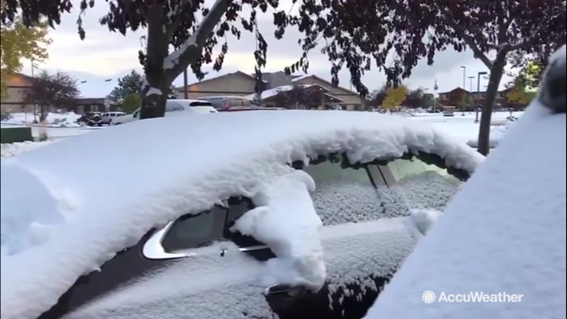 In the aftermath of a winterlike storm, many vehicles were seen buried in snow in Billings, Montana, on Oct. 10.