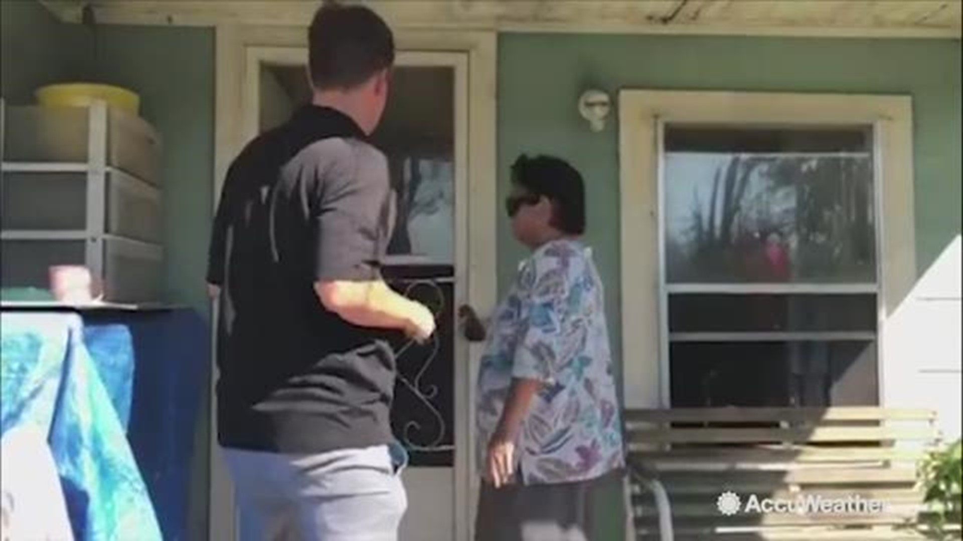 Extreme meteorologist Reed Timmer does a walkthrough with a resident who survived Hurricane Michael In Panama City, Florida. She warns people to always evacuate if you can and she won't make that mistake