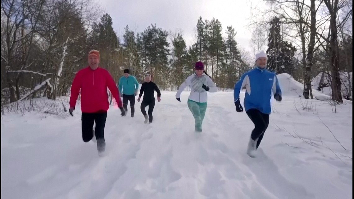 Snow Way! Finnish Runners Exercise in Deep Snow Only Wearing Socks!