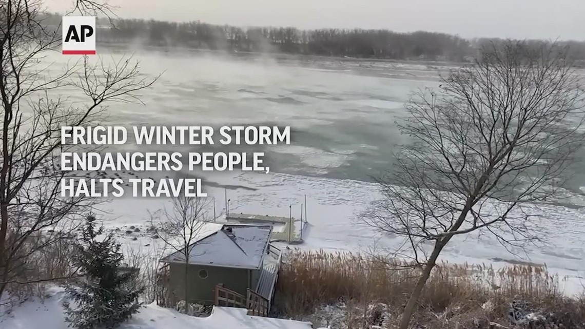 Frigid winter storm endangers people, halts travel