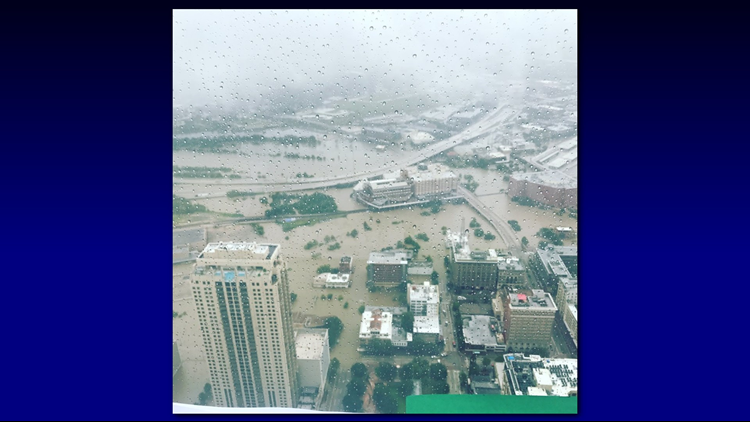 Photos shows widespread flooding in downtown Houston