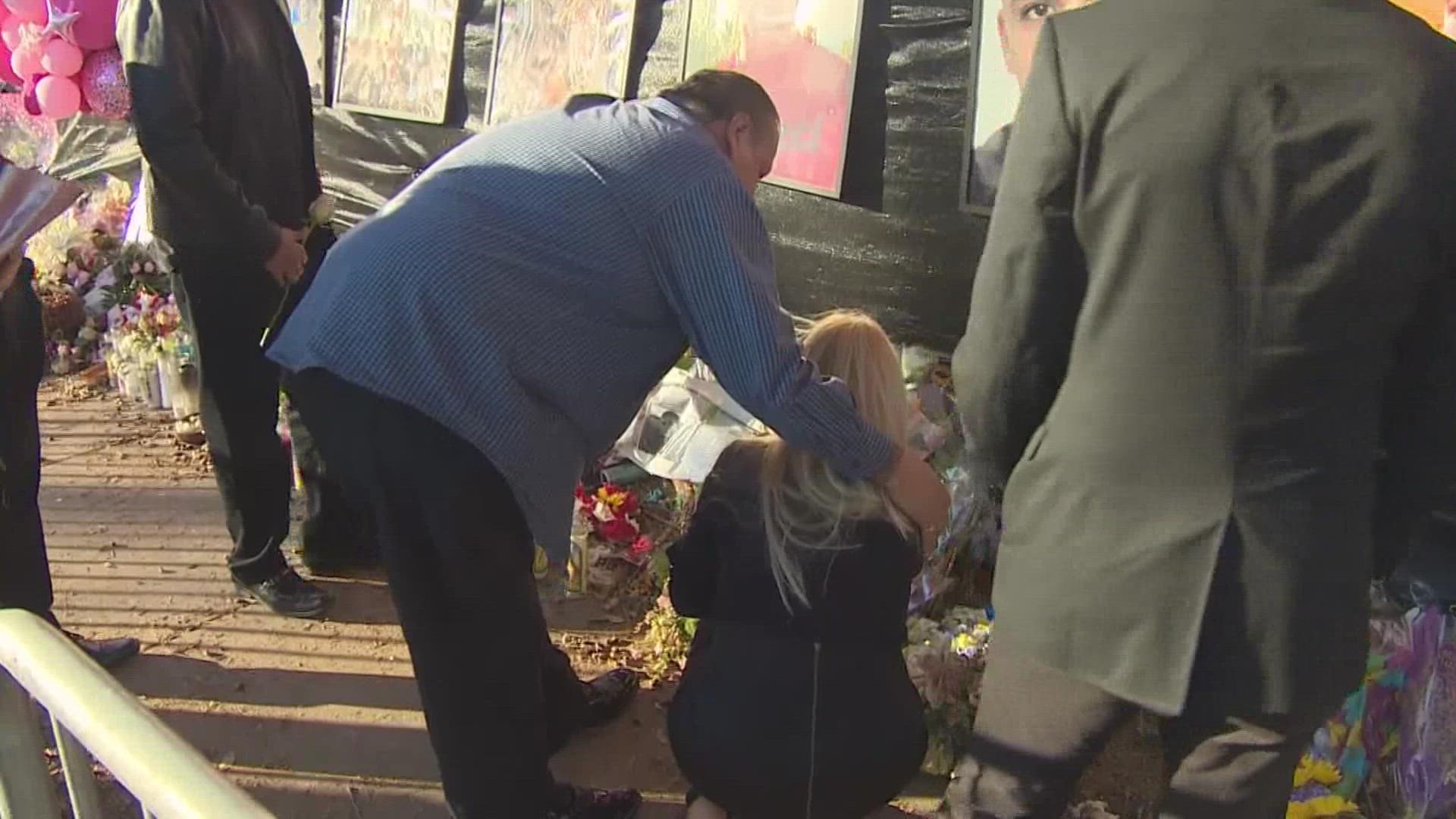 The family of Rudy Peña, the 23-year-old Astroworld Festival victim, visited NRG Park this afternoon and laid flowers under Rudy's picture hanging outside the gate.