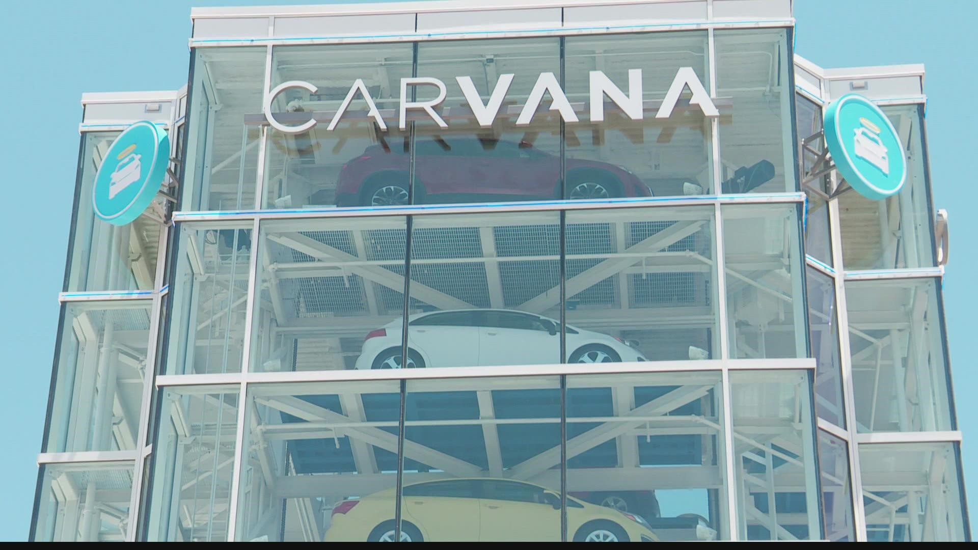 On the same day Carvana announced it is cutting employee rolls, the company also purchased an auto auction business for $2.2 billion.