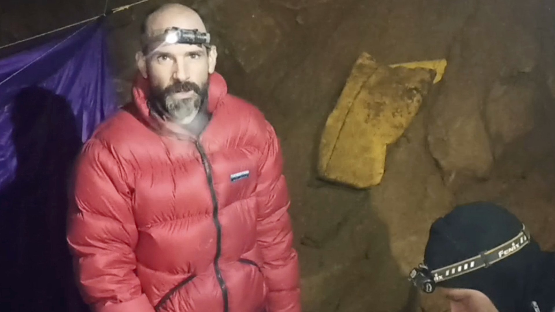 In a video message from inside the cave, American Mark Dickey says he was "very close to the edge" when medical supplies reached him 3,000 feet below the surface.