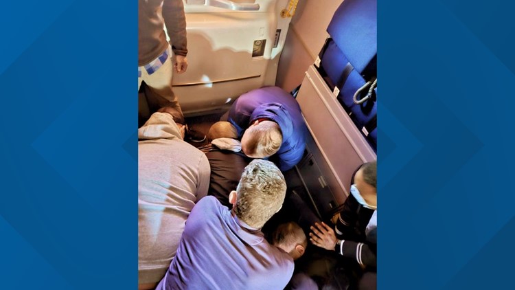 How passengers teamed up to restrain man on chaotic flight to Boston