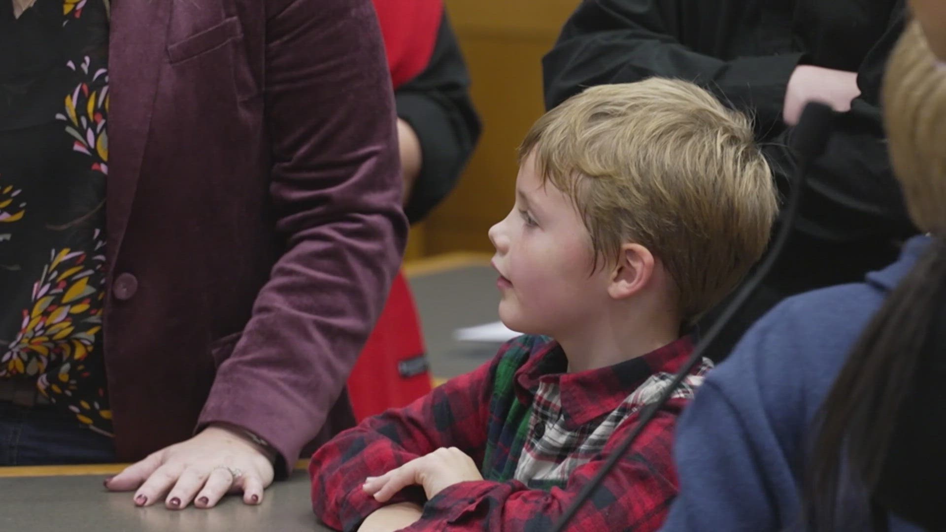 WFAA was in the courtroom, as three siblings joined their forever family - just in time for Christmas.