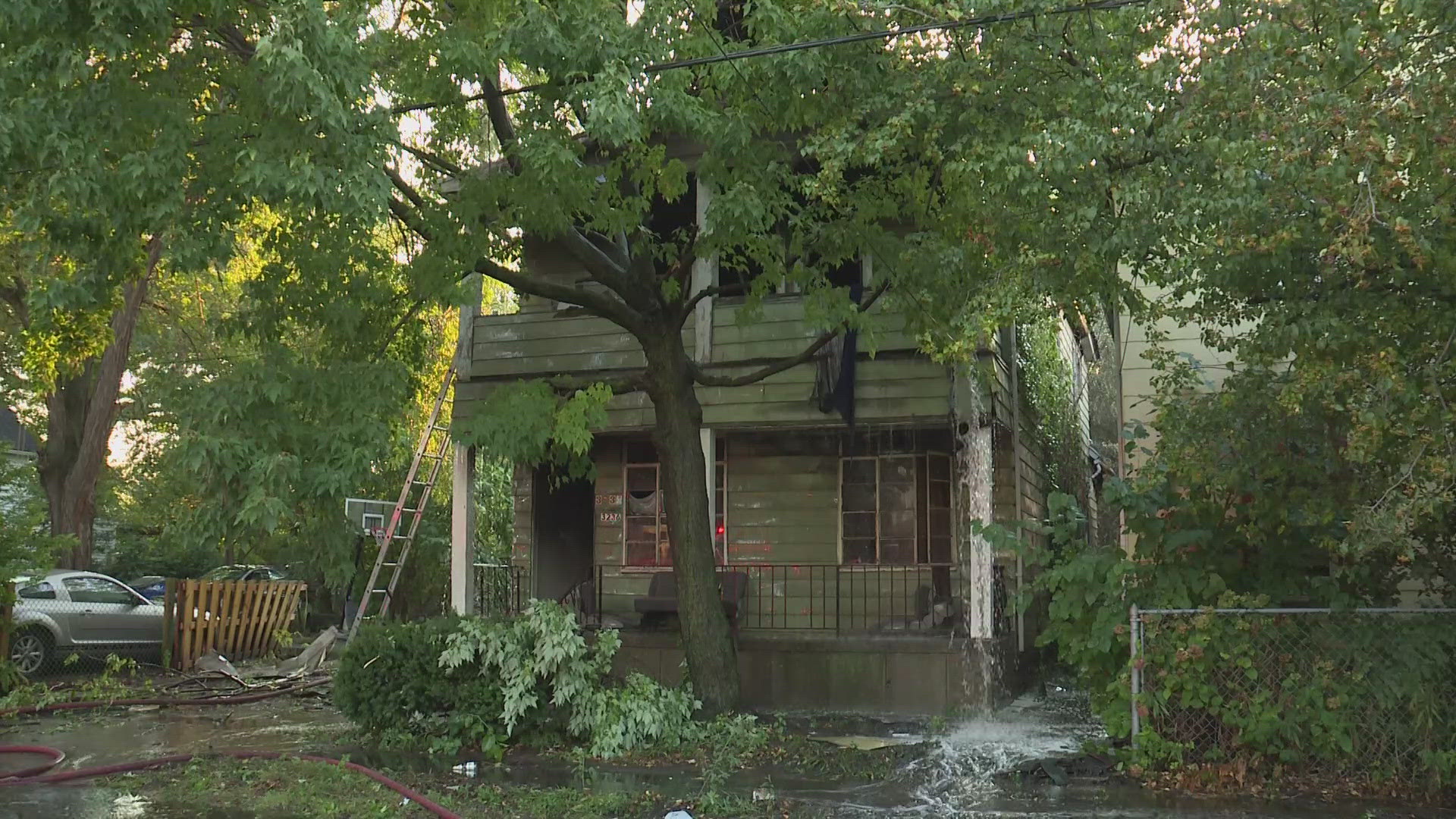 The trio of men rescued Amanda Goddard as she jumped from her second-story porch.