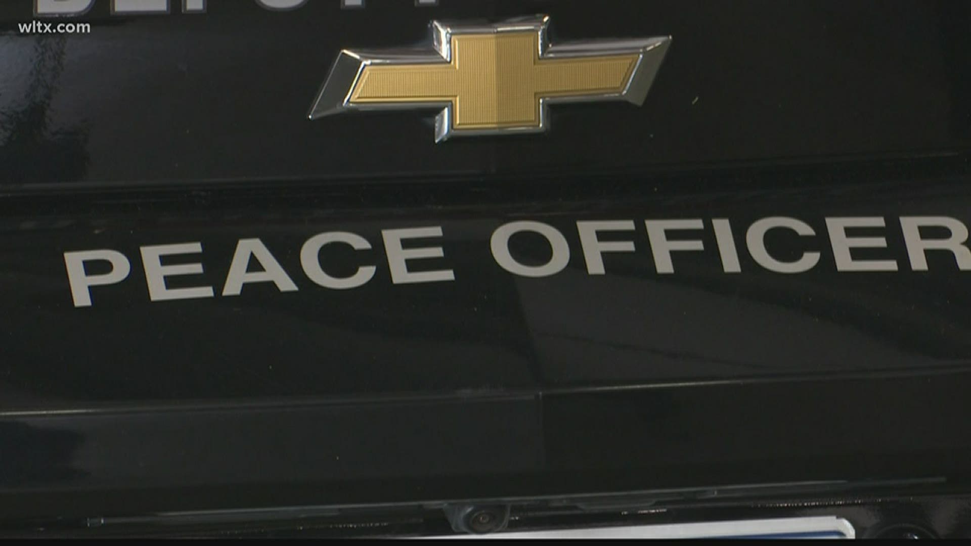 The department vehicles also have stickers that read 'Peace Officer.'
