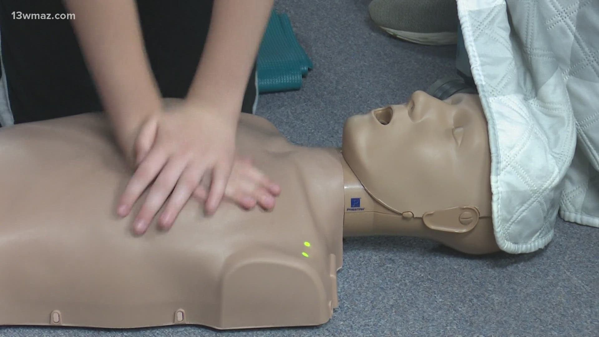 Children and families gathered for a hands-on CPR class on Saturday to learn about the right technique, how to build trust within the community, and teamwork.