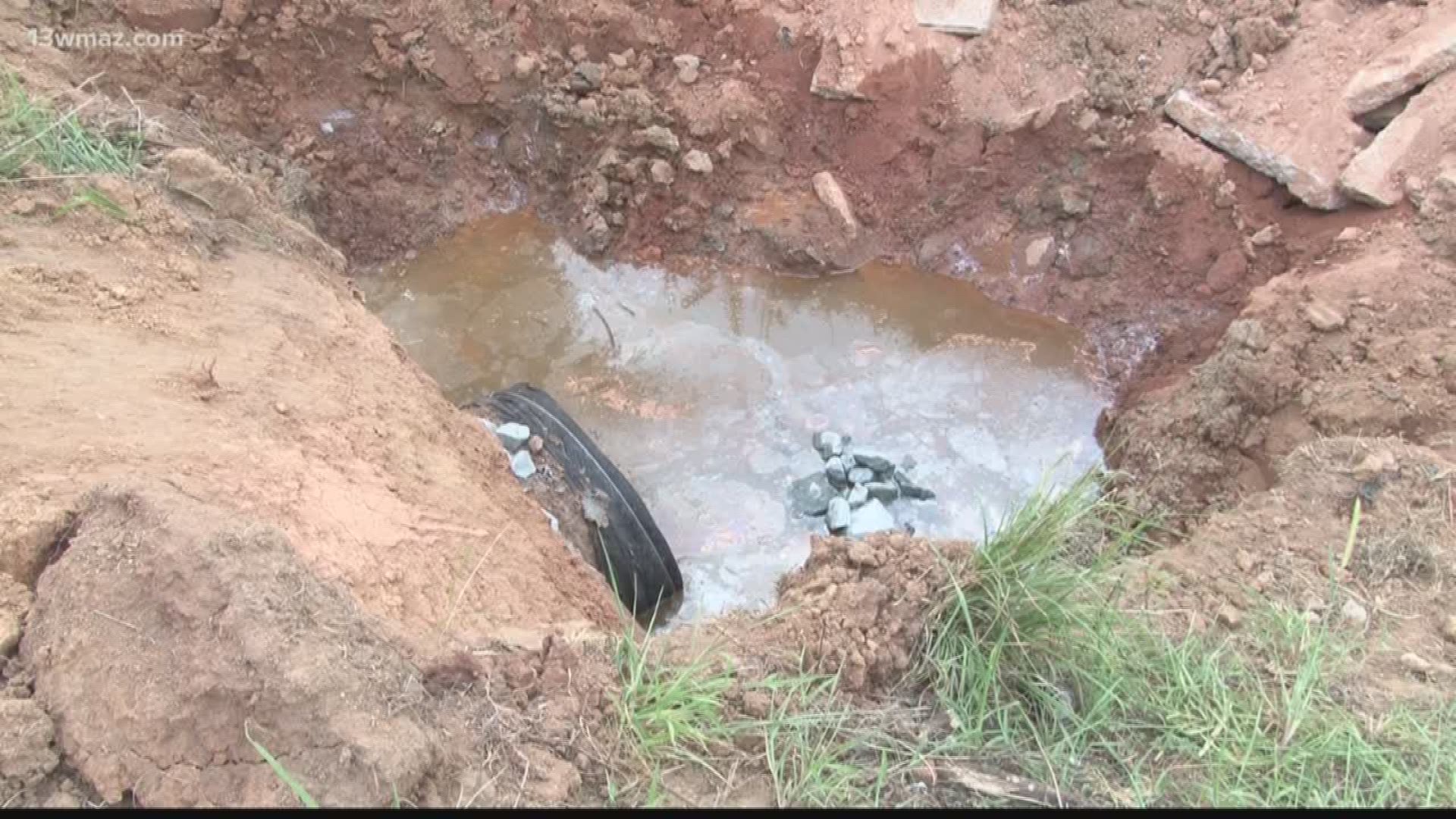 A Baldwin County couple says a damaged storm drain is causing a pond on their property to flood into their yard. They want the county to fix the issue.