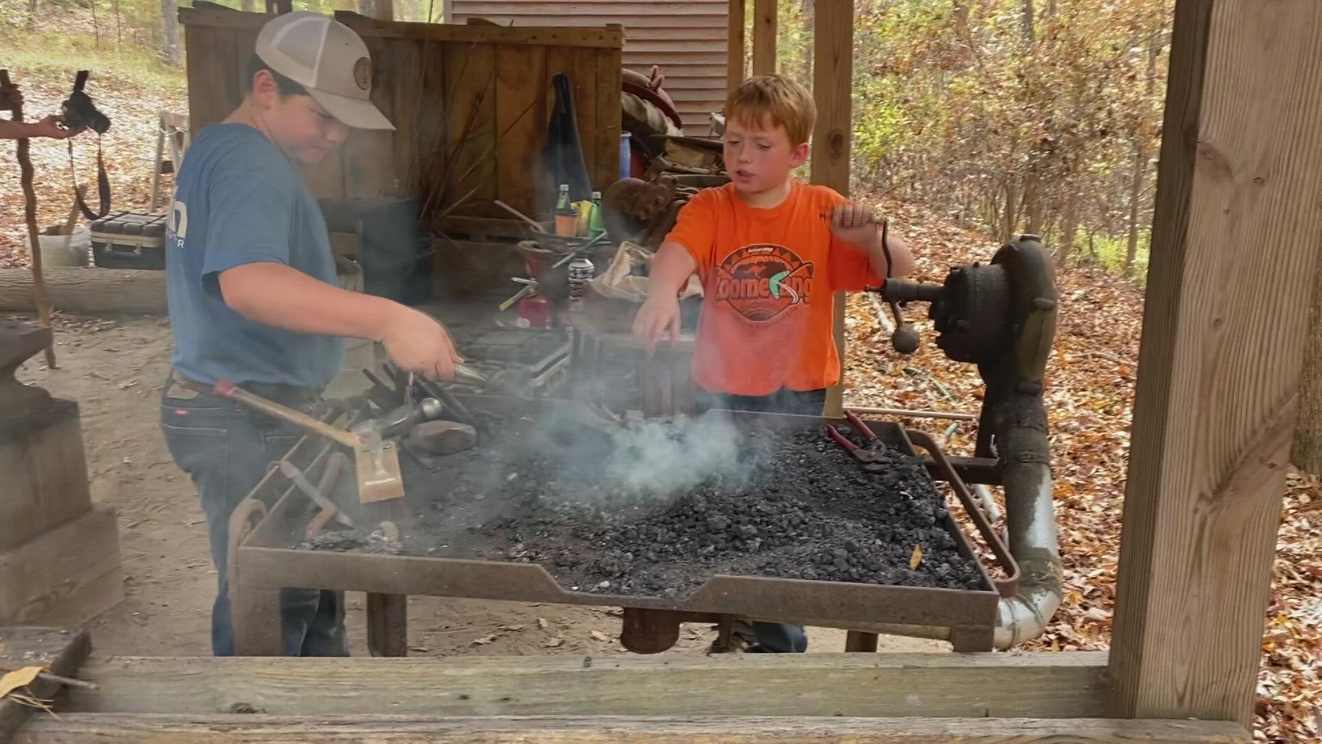 Folks experience the sights of how cane syrup is made.