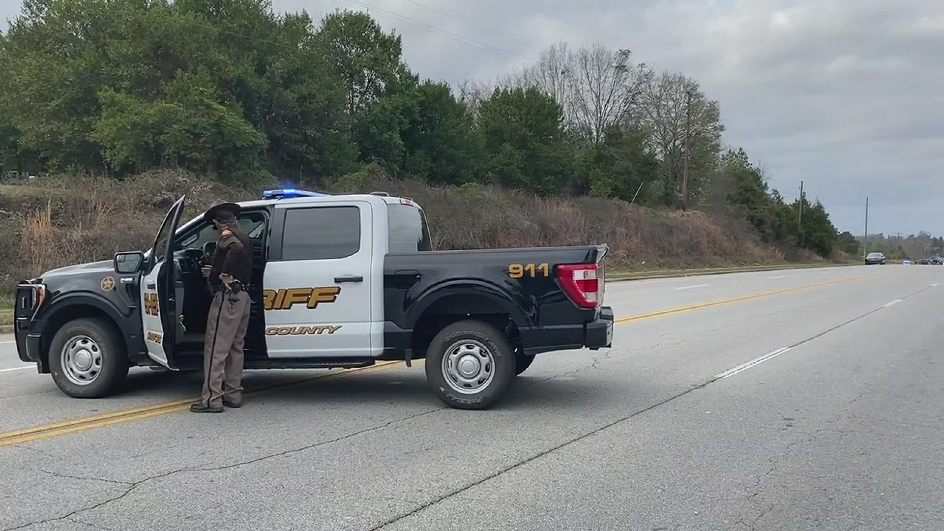 The GBI is investigating after a Roberta man was fatally shot after a chase and fight over a deputy’s gun.