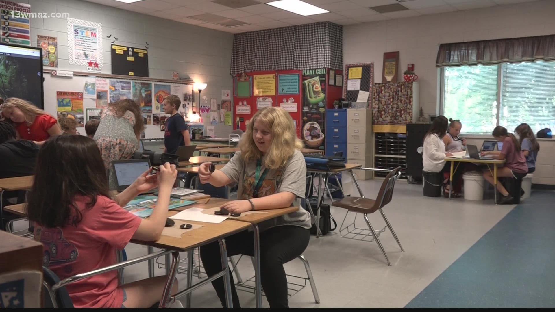 Last school year's fifth graders had above average science scores on the Georgia Milestone test.