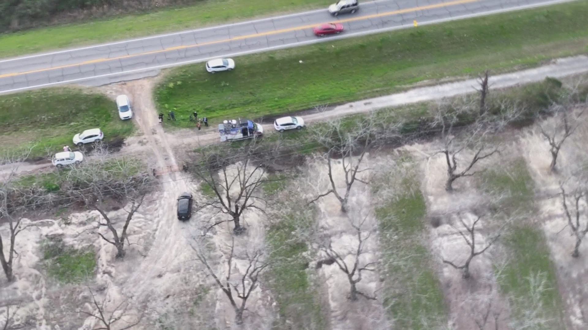 Chopper footage by WXIA-TV in Atlanta shows crews searching a Fitzgerald farm for remains of Tara Grinstead.