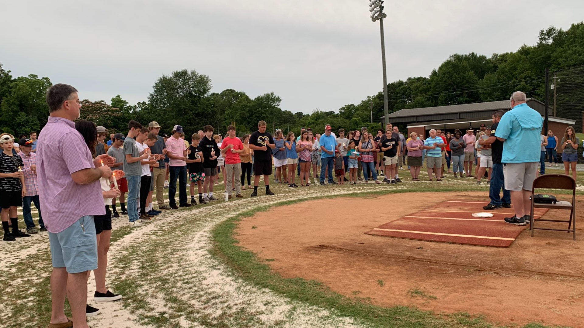 A candlelight vigil was held on the Mary Persons baseball field.