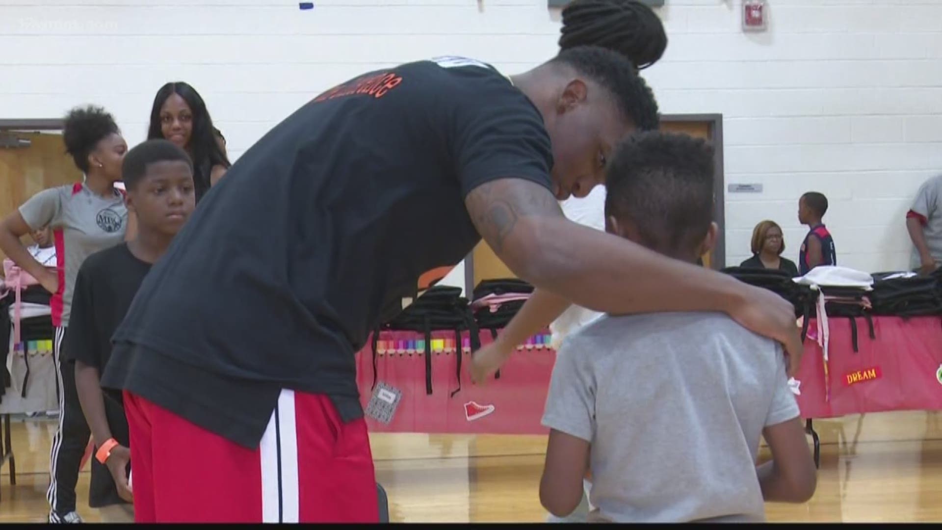Twiggs County native and NFL star Darqueze Dennard held his first Nike backpack giveaway at Rosa Jackson Center in Macon. More than 200 students lined up for a chance to win prizes and see the NFL star.