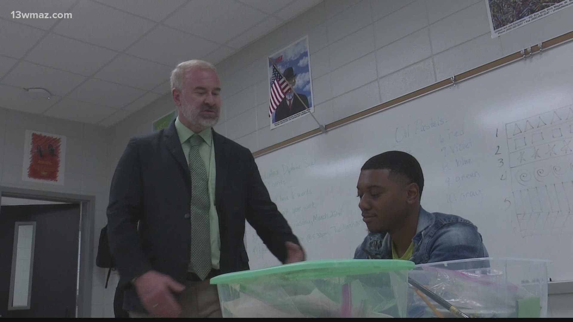 Dr. Jesse Davis walked the halls of Peach County High School as principal for the first time Monday.