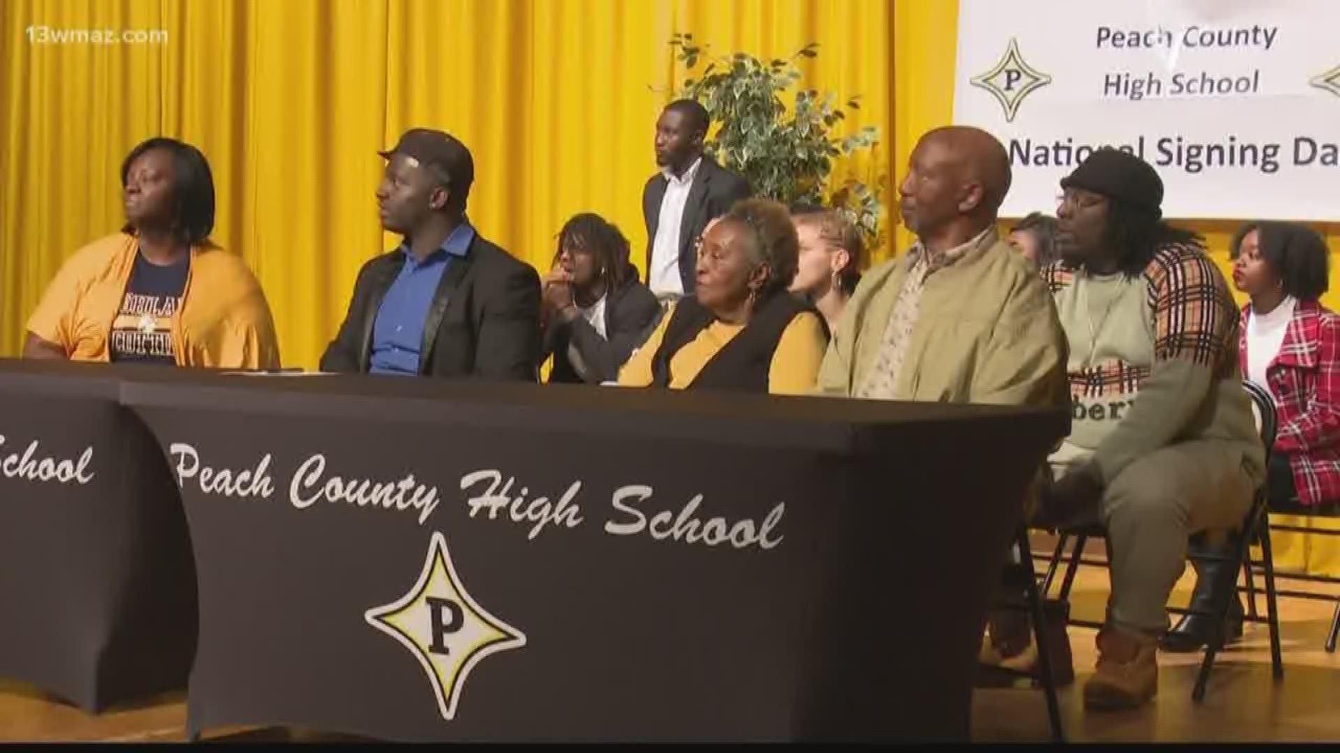 High school seniors across Central Georgia signed with their NCAA school of choice to continue their sports careers into college.