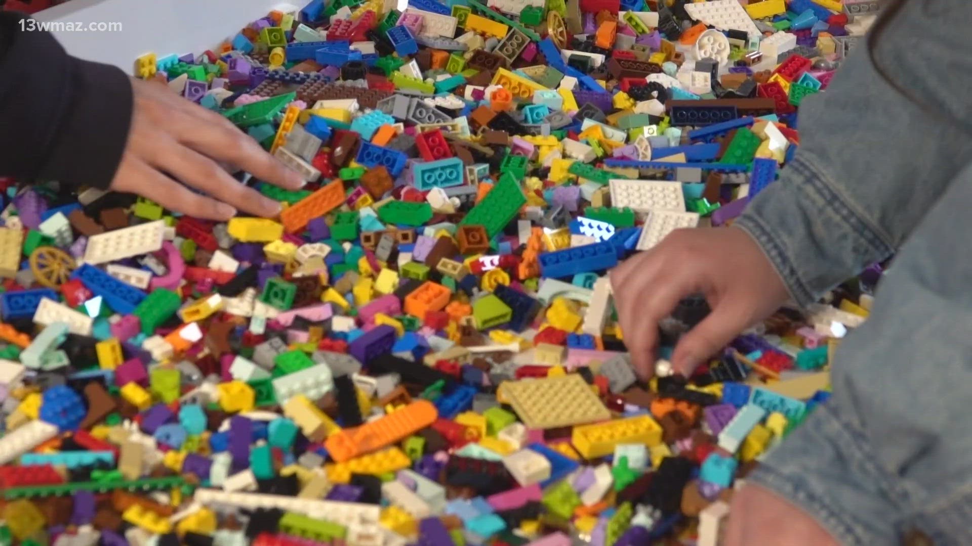 The store sells Legos and Cobi blocks, and lots of families came out to their grand opening Friday morning to grab some sets.