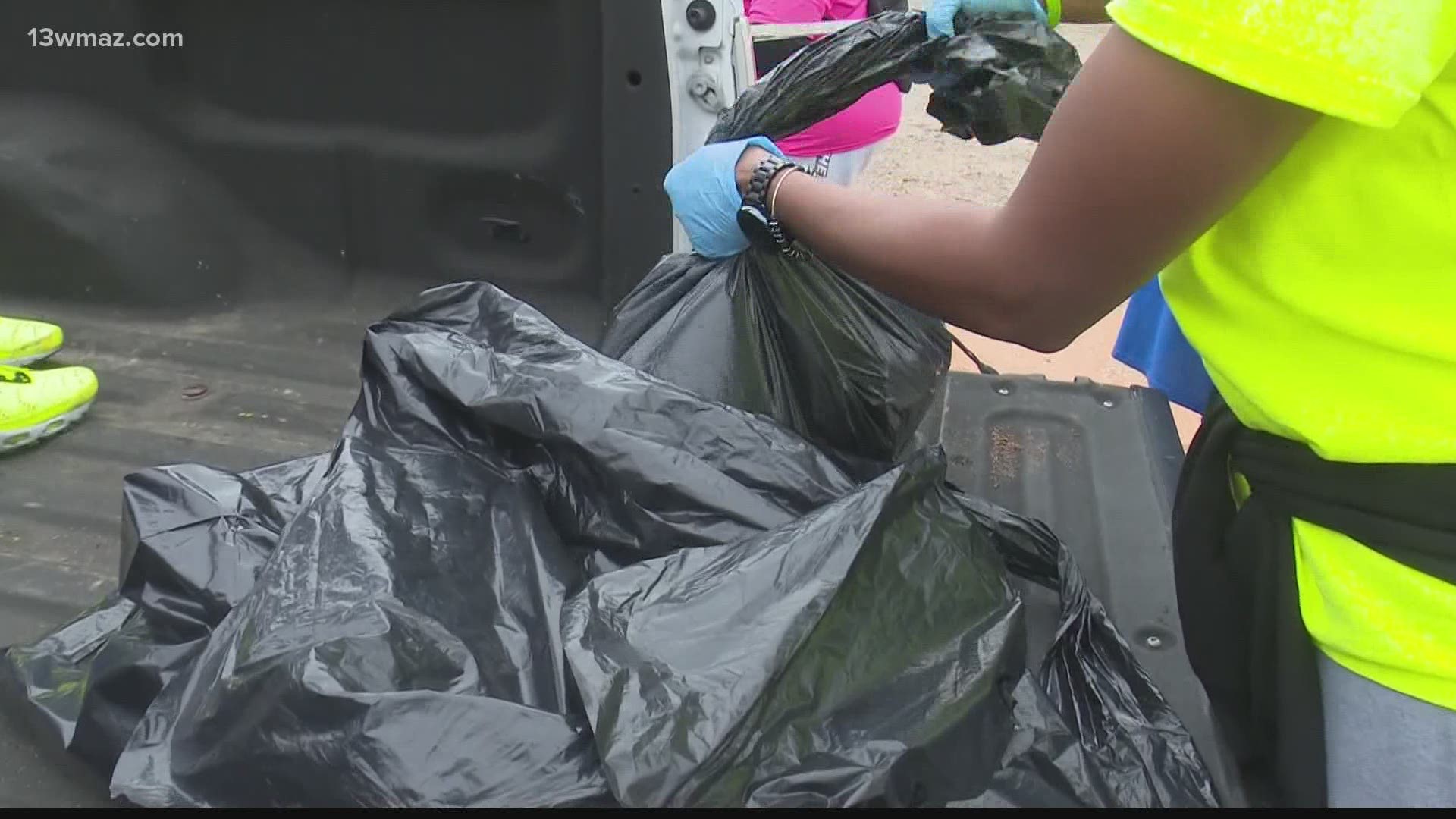 People all across Macon gathered Saturday to help clean trash and remove debris from streets and neighborhoods.