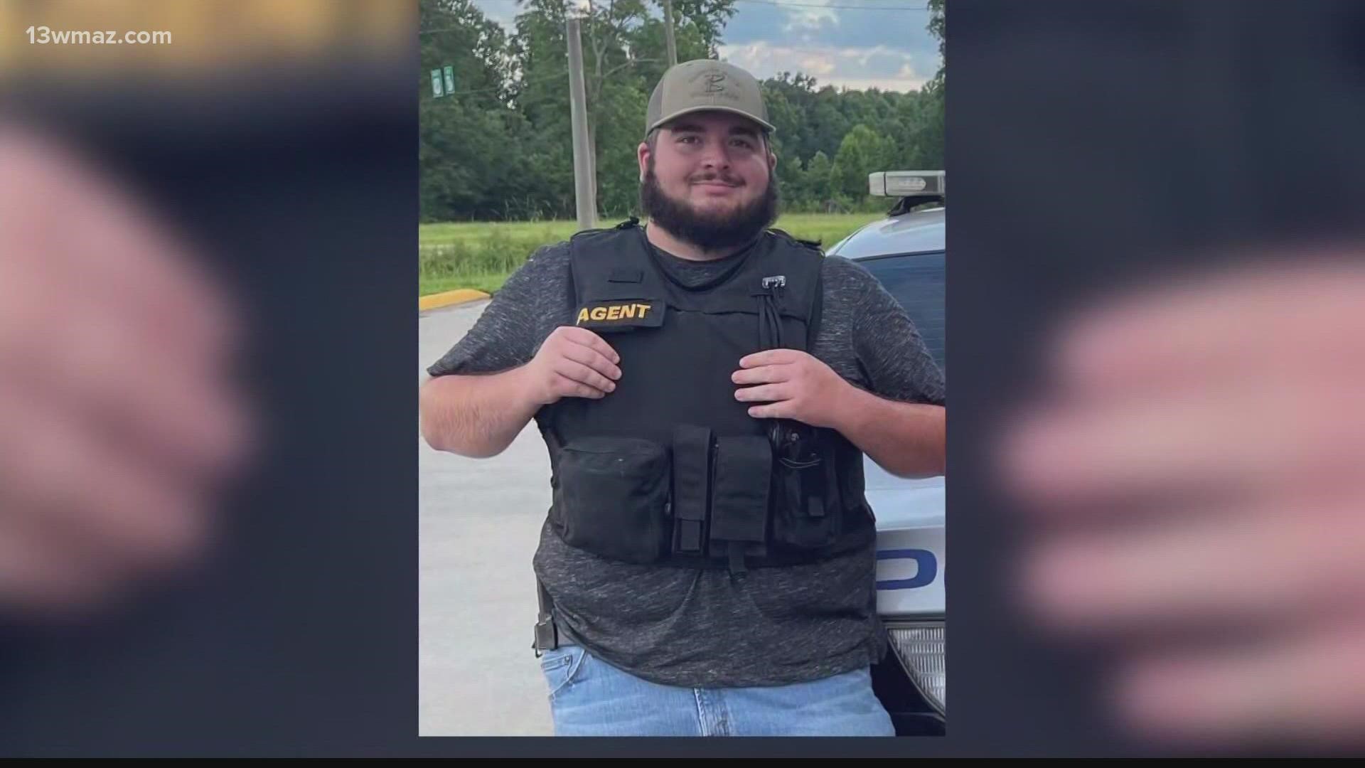 People in two counties and Central Georgia's law enforcement community mourned as Dylan Harrison's body was escorted home Monday.