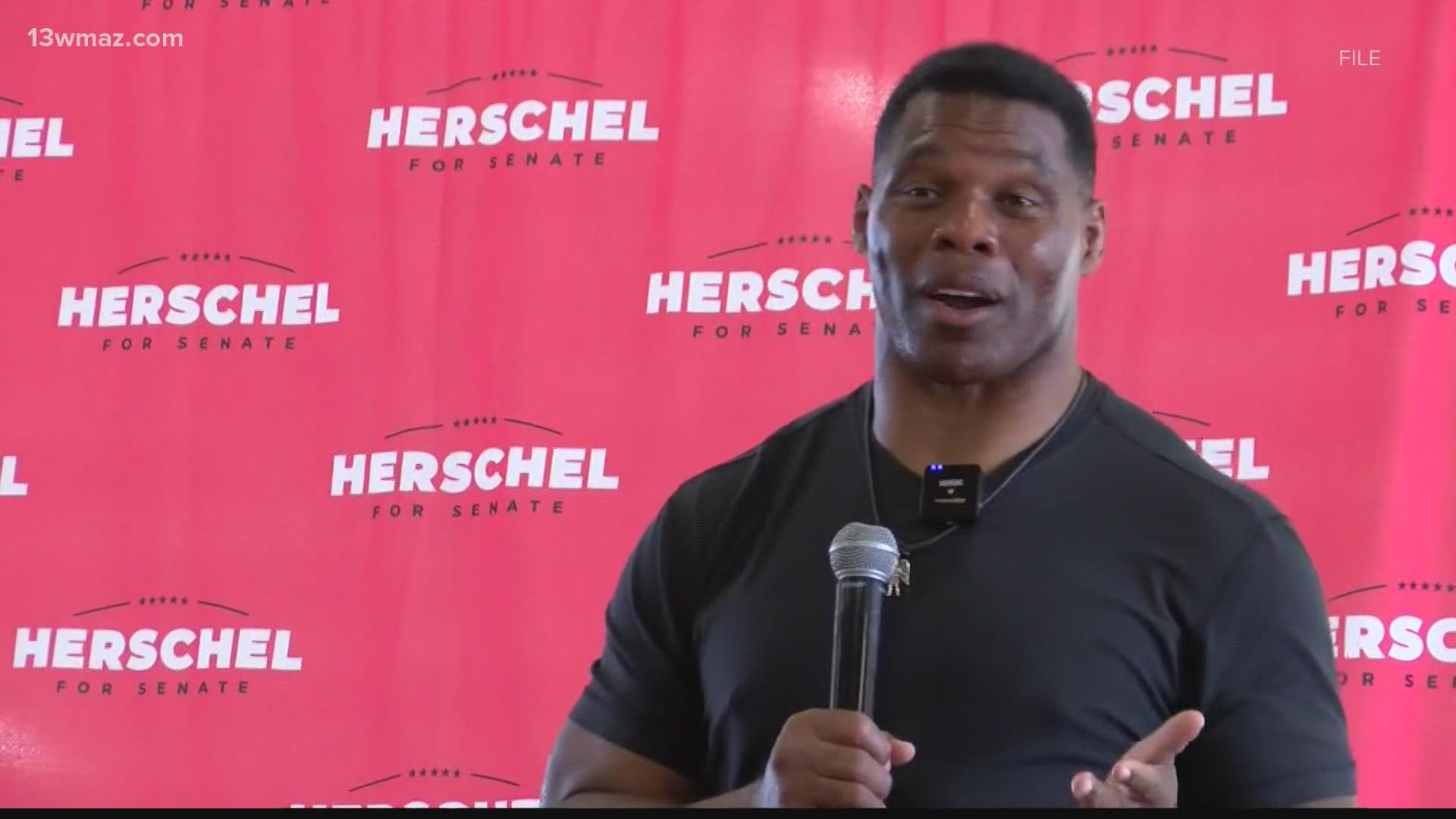 Herschel Walker visited the Georgia Sports Hall of Fame in Macon hoping to get voters excited about next week's primary election