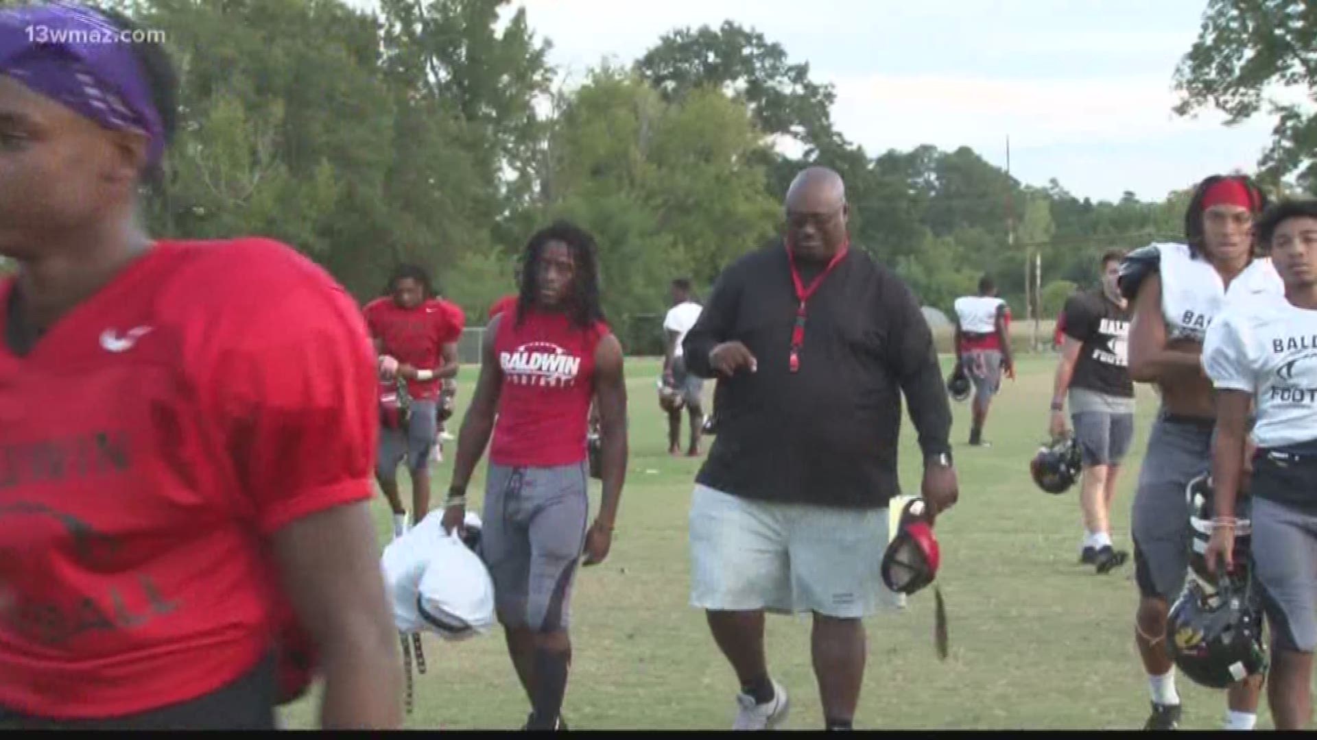 Baldwin High football coach Jesse Hicks and player Noah Hill have become inseparable after the passing of both of their moms in the last year.