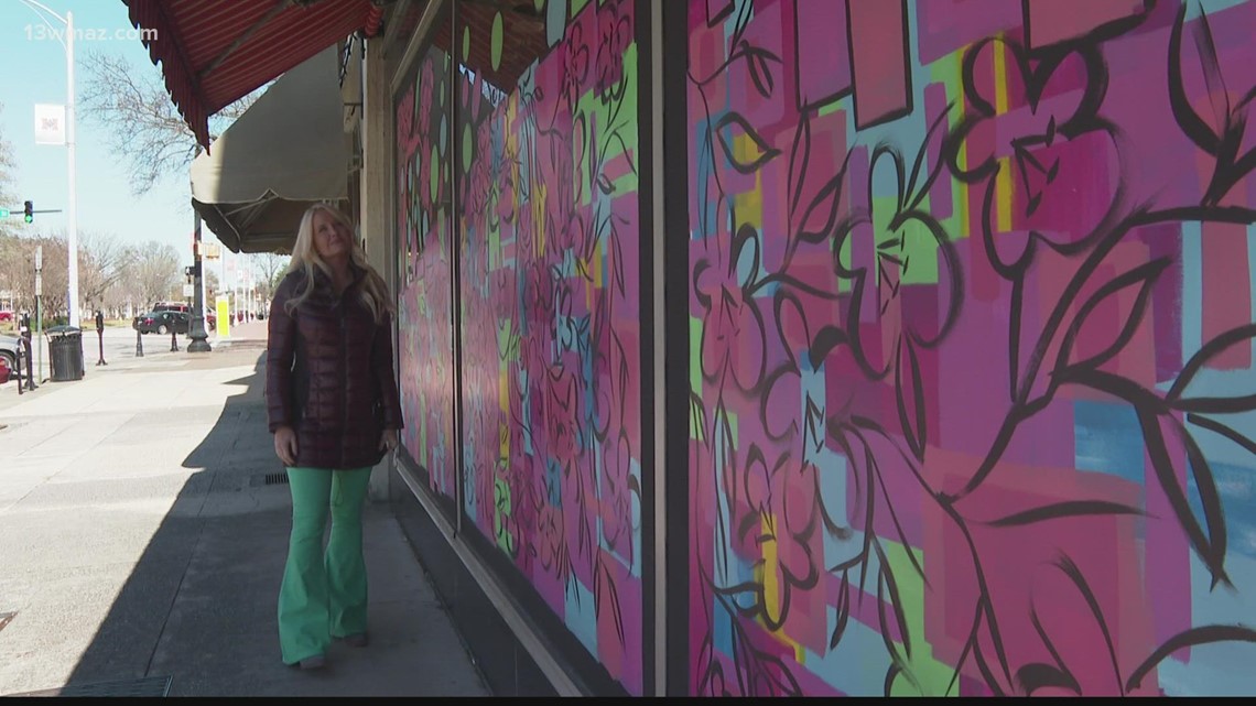 Macon artist recovers from injuries, paints mural for Cherry Blossom Festival