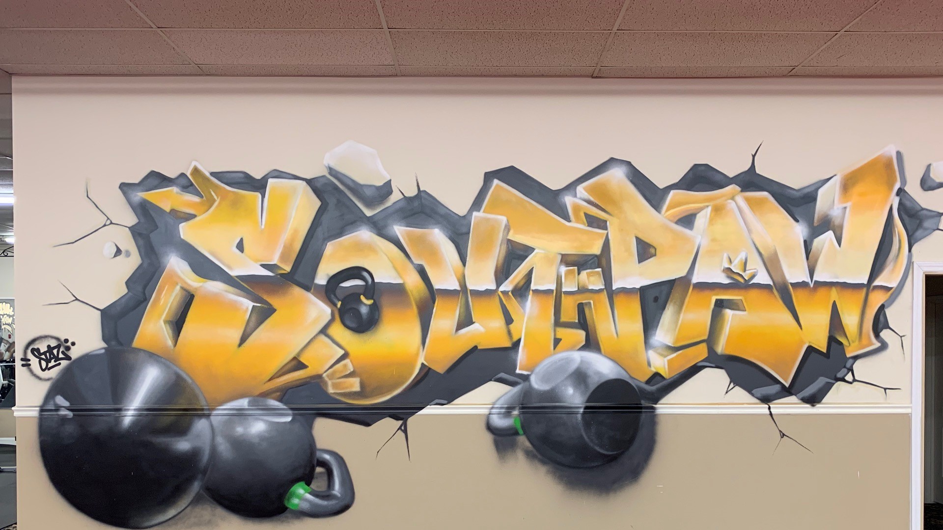 South Korean graffiti artist creates murals at Southpaw Fitness