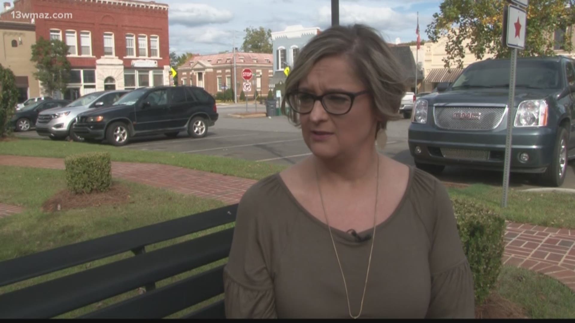 A Washington County mother says fear turned into relief when she got $100,000 and received an apology after she was arrested for a Facebook post.