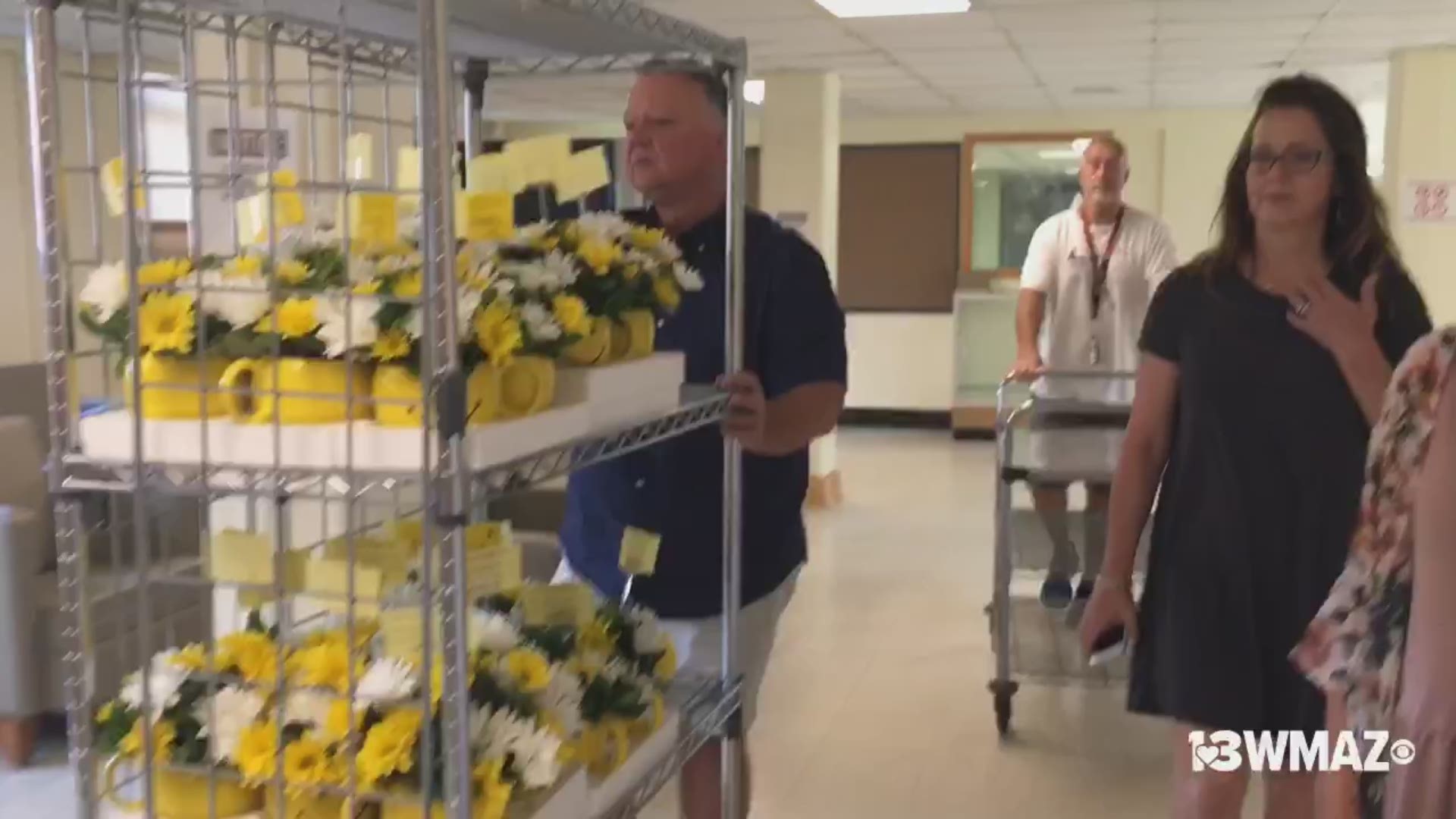 Randy Stone of Classic Florist and Home Decor took the time to make over 200 veterans at the Carl Vinson VA Medical Center feel special Wednesday by giving them flowers.