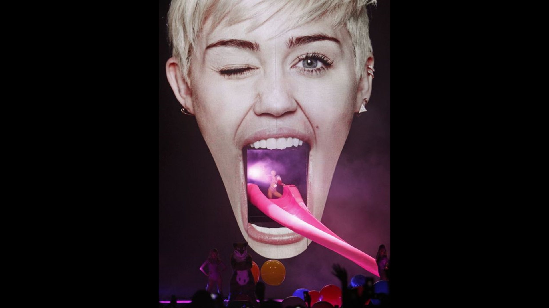 Miley Cyrus Tongue Slide Leads To Lawsuit 9968