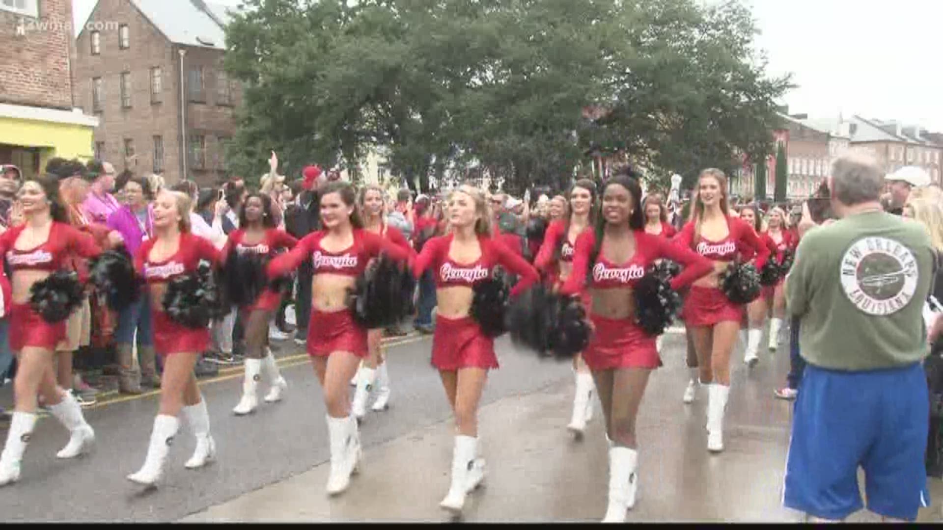 Fans took to the streets of New Orleans for a parade a day before the big game.