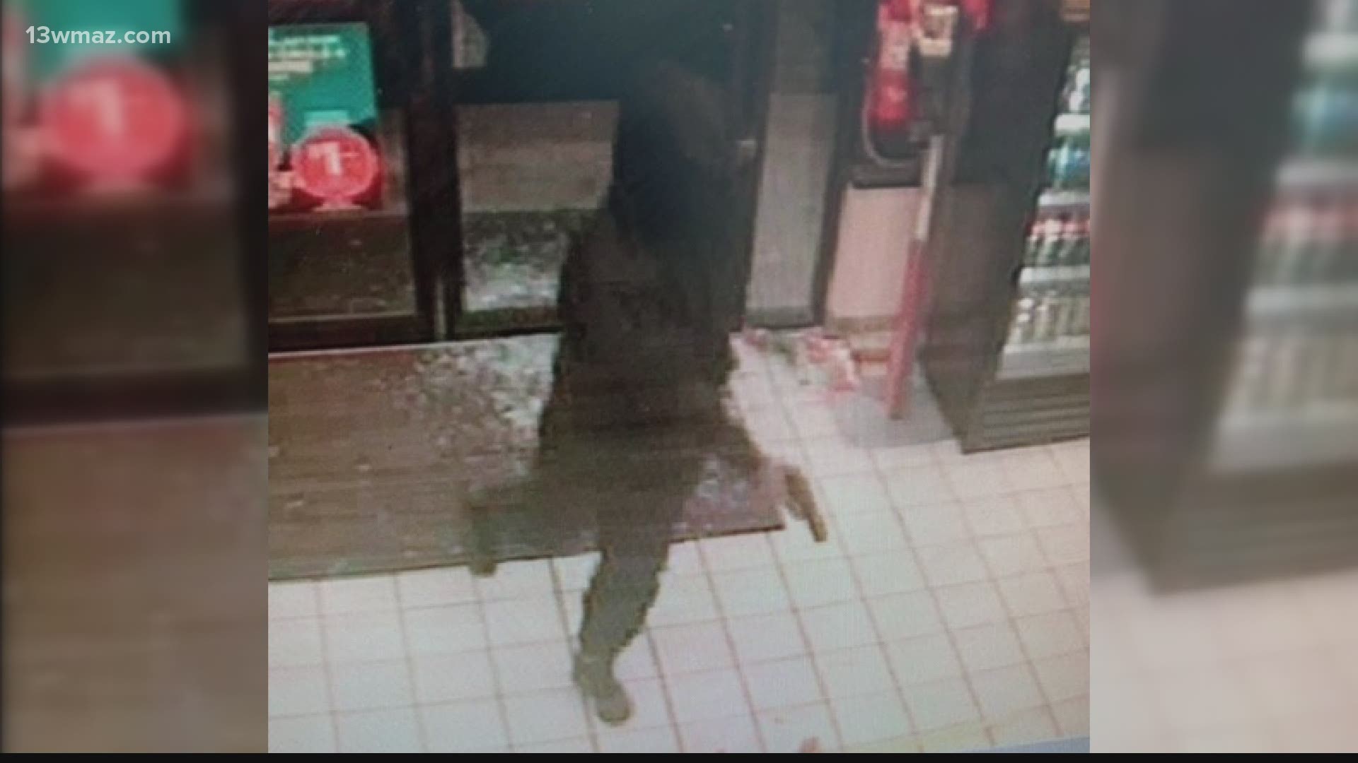 A man threw a brick through the glass of the convenience store's locked door, ran inside, and demanded cash.
