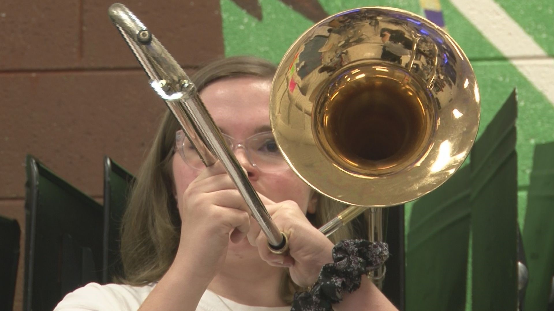 Band Director Bruce Fisher started with 20 students when he took the position three years ago. Now he has close to 60 members in the marching band.