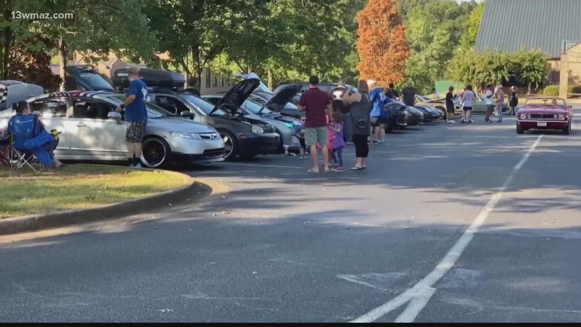 The car show event included food trucks, raffles, music, and a scholarship given out in Bethune's name.