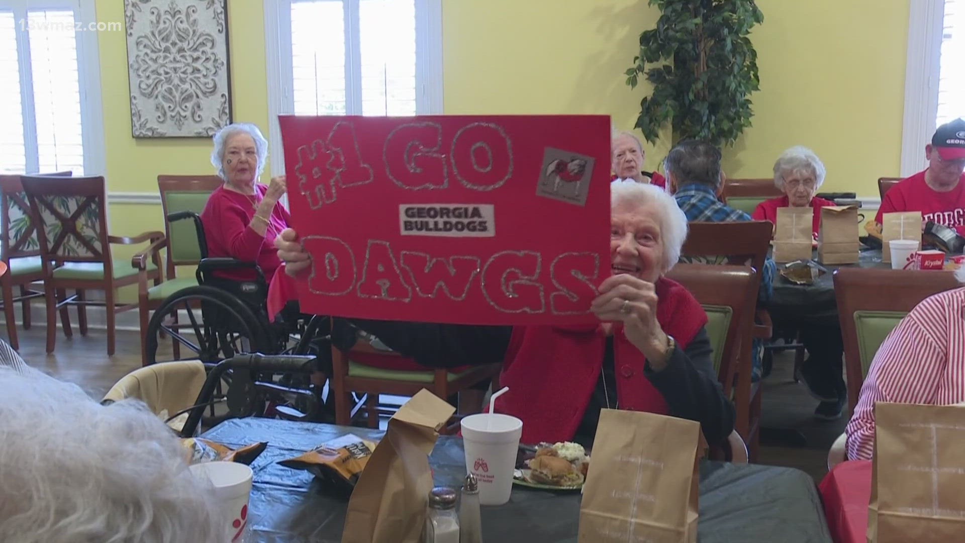 Residents were decked out in their red and black and the staff put up a big tailgate tent to prepare food and snacks.