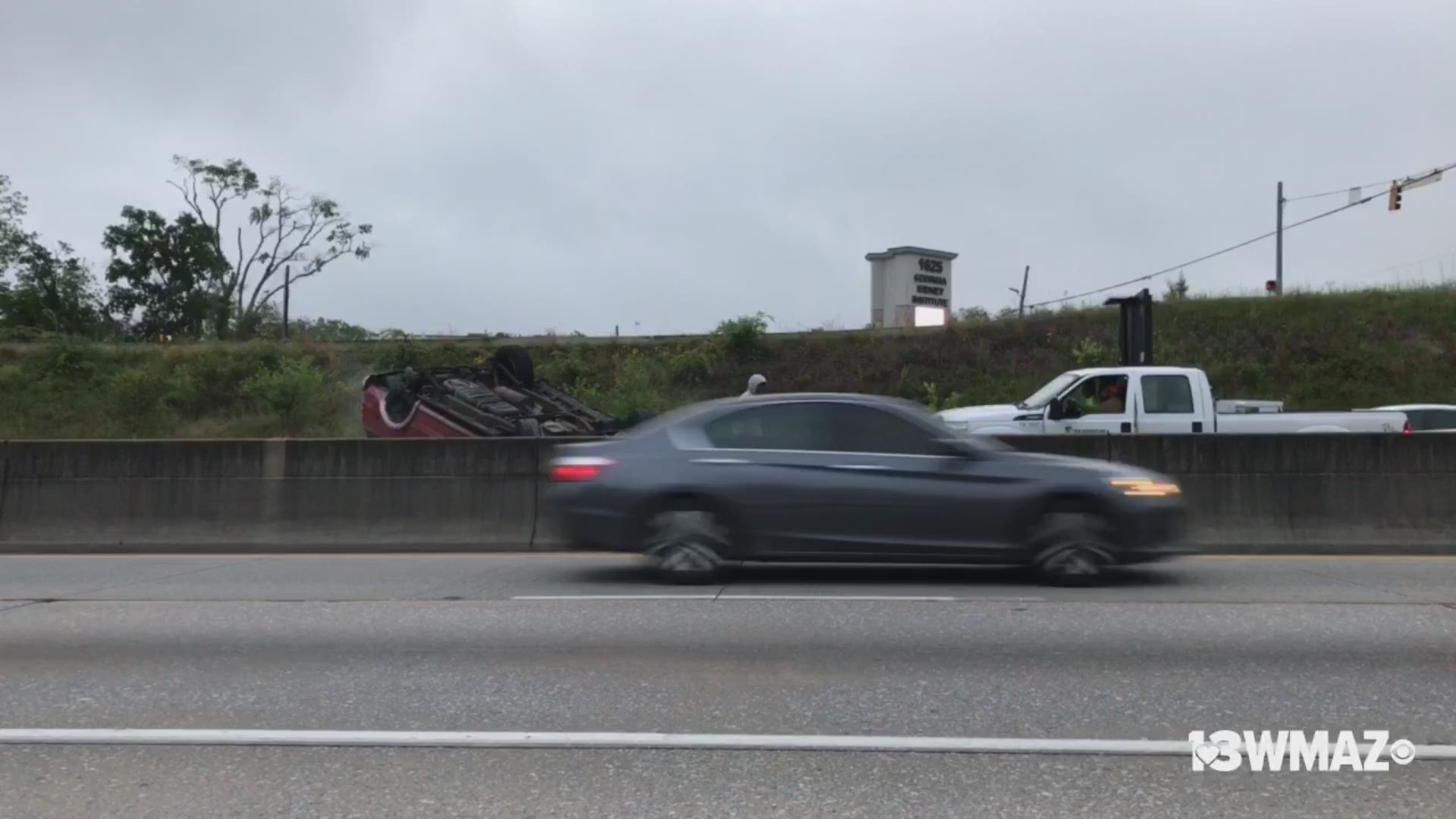 Car flipped over on I-75 North in Macon