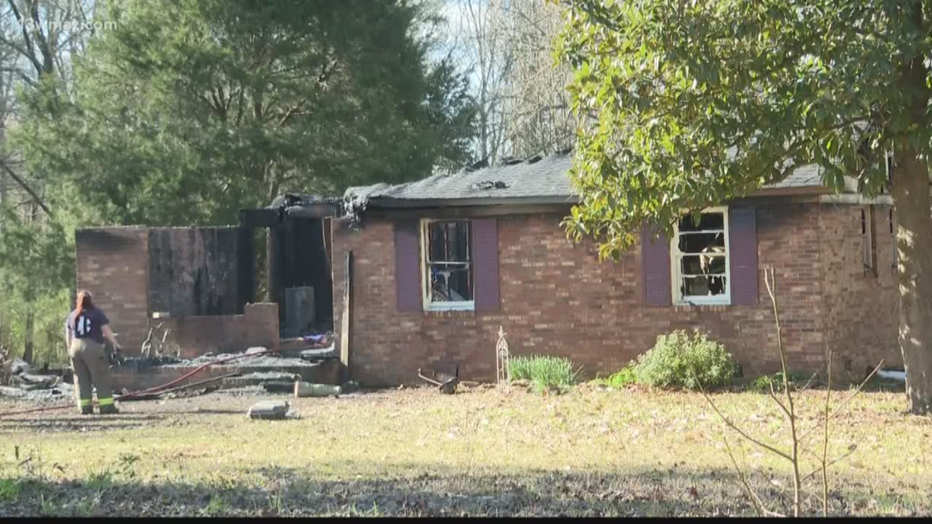 The fire broke out at a home on Old Zebulon Road early Thursday morning. A young woman and man were found dead inside.