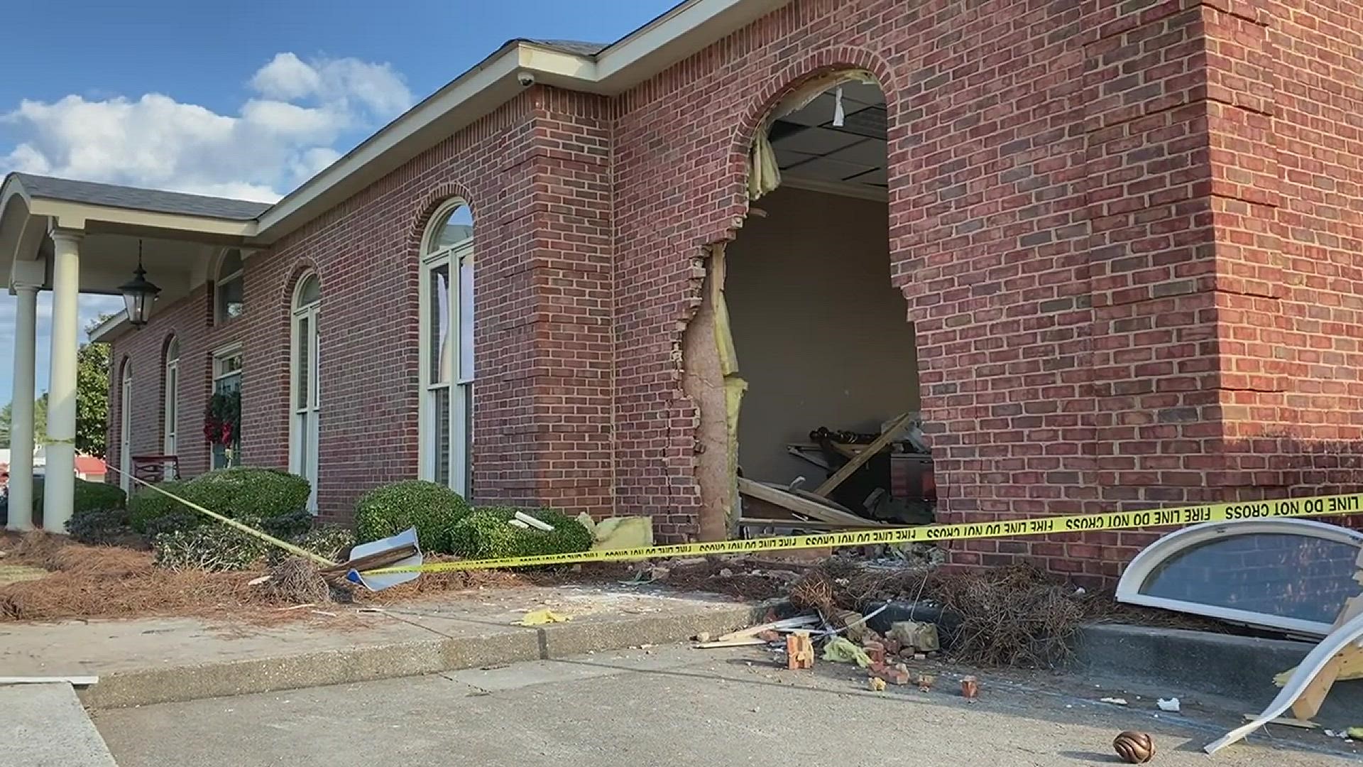 According to Mell Merritt with Magnolia State Bank, a driver crashed their Jeep into the side of the bank, leaving a large hole. No one was hurt.