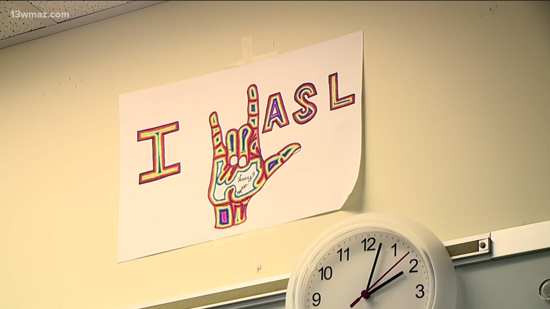 ASL is a visual language. When people "sign", they use facial expressions, shape, placement and movement of hands to communicate