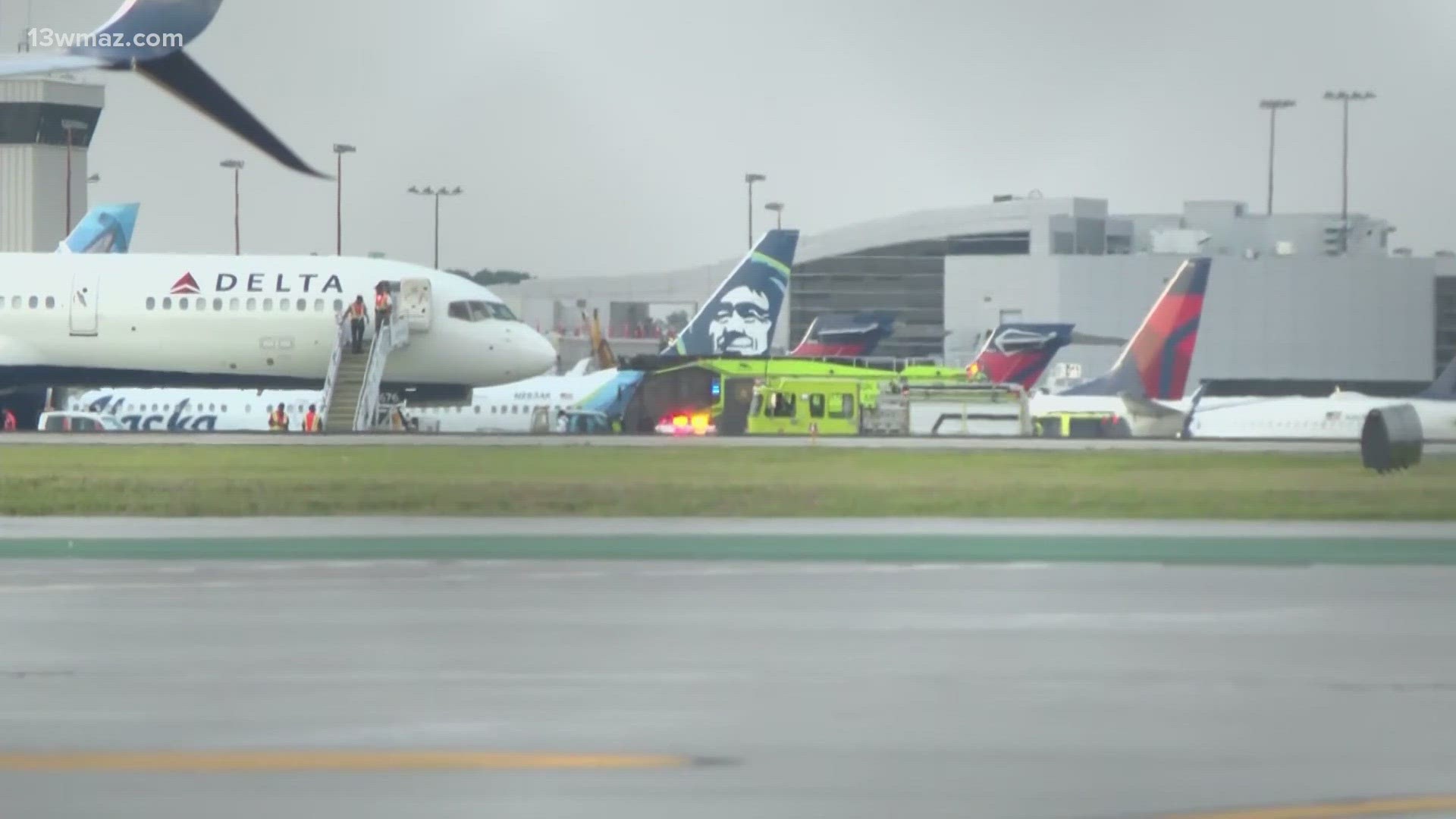 Delta plane’s landing gear catches on fire in Atlanta, emergency crews