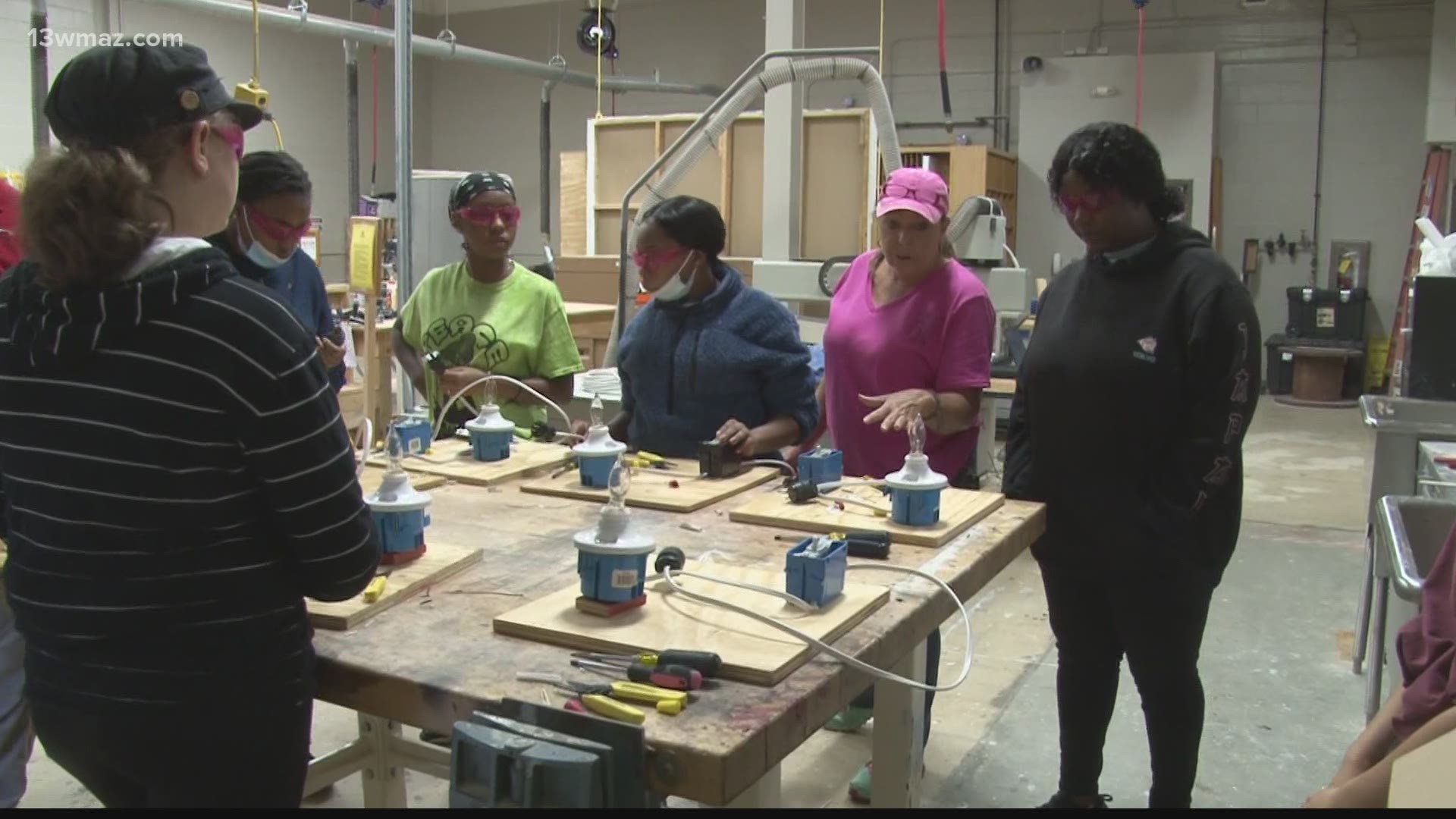 Campers are learning fundamental skills in carpentry, welding, plumbing and operating heavy machinery.