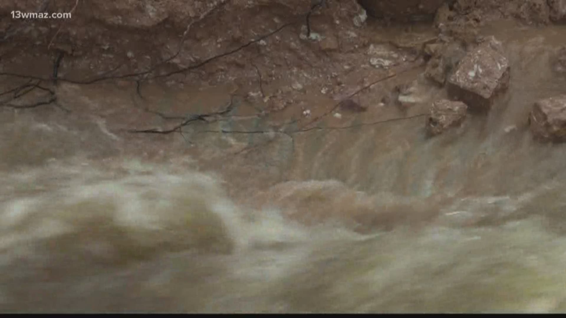 Rushing rapids have carved a river running straight through the red clay, chipping more away minute by minute.