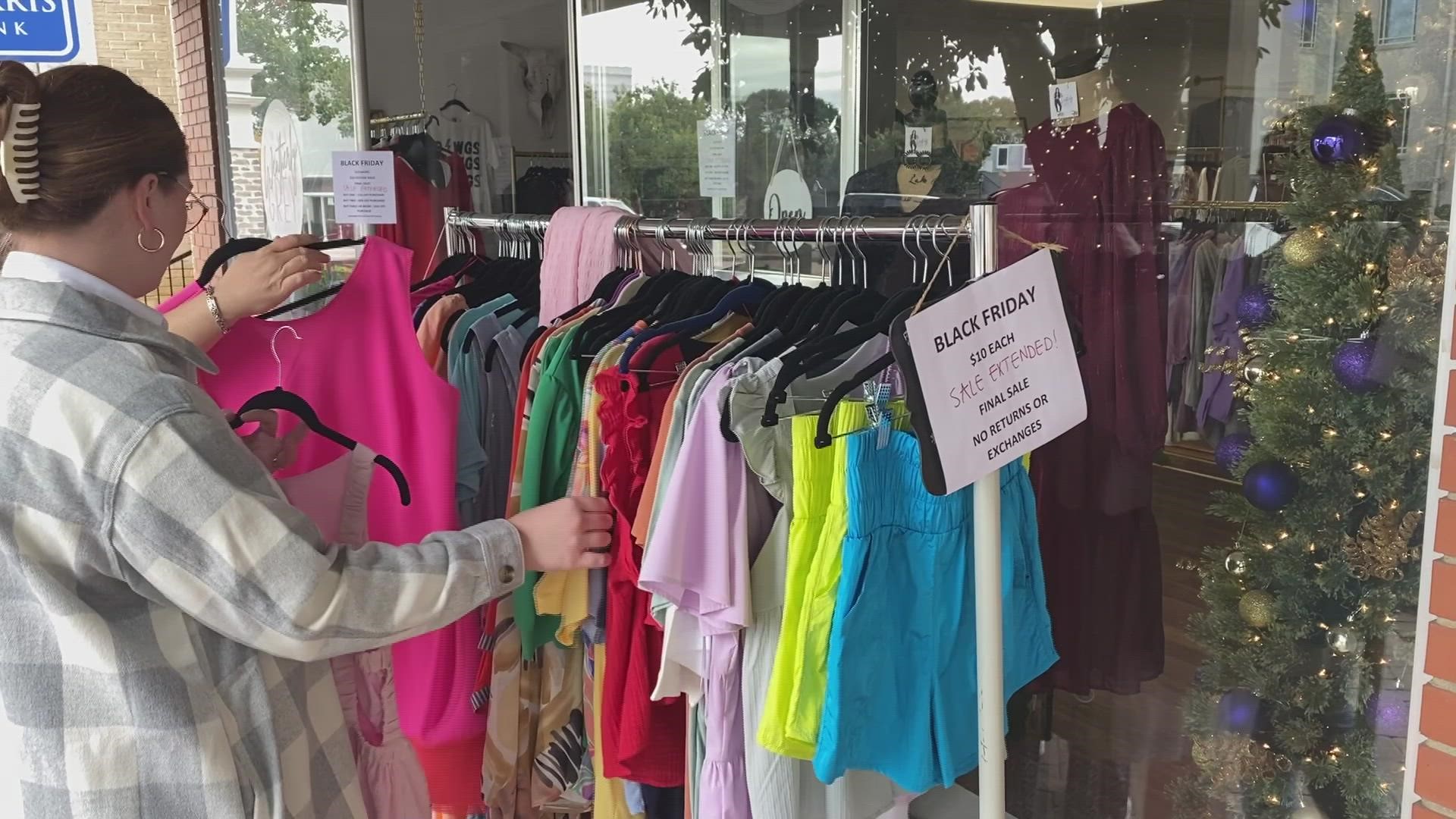 shoppers stroll around Perry looking for items on small business Saturday