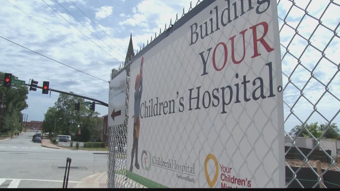 Dozens of MaconBibb city leaders participate in ribbon cutting at new children's hospital