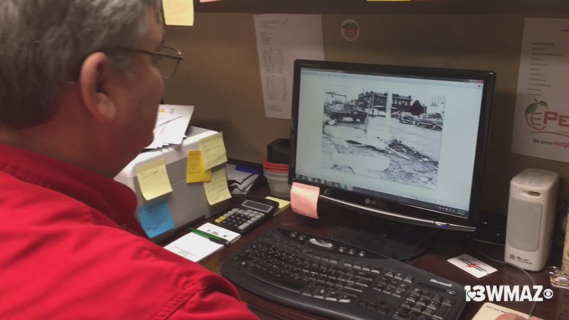 It's been nearly 45 years since a tornado hit Fort Valley. Peach County EMA Director Jeff Doles shows reporter Kayla Solomon photos from the weather event