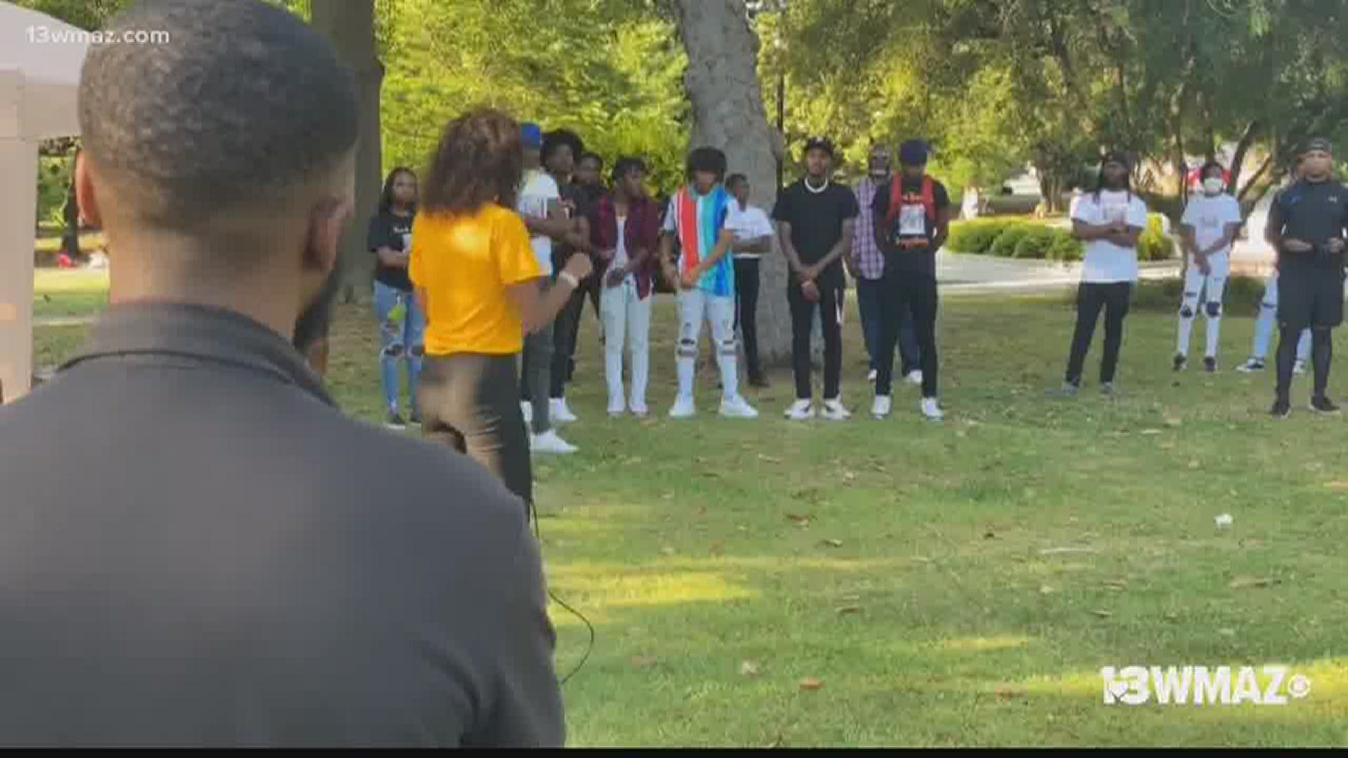 Several community members came together at Tattnall Square Park to rally against gun violence