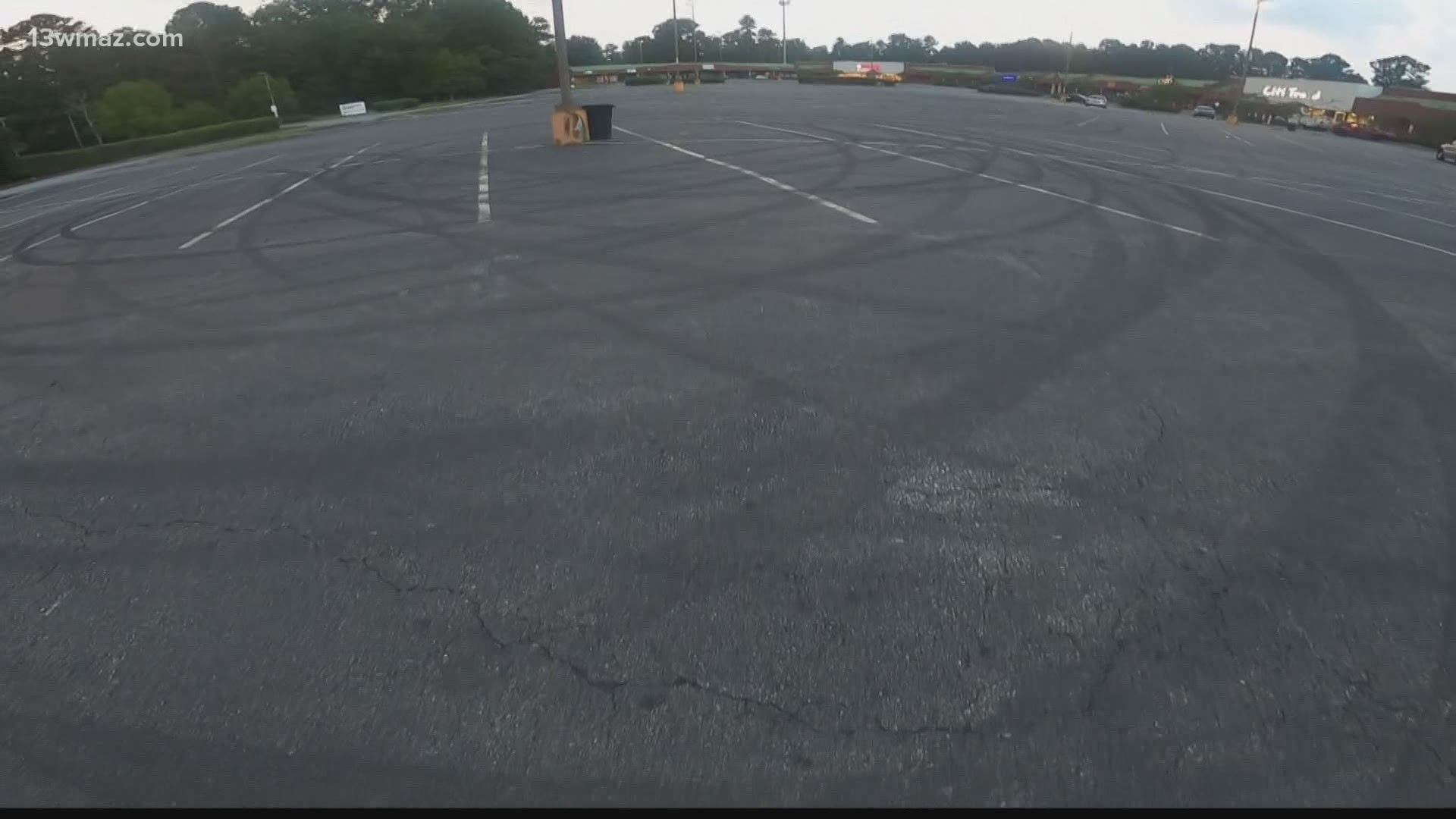 Nearly a dozen people were arrested over the weekend after deputies broke up racing in a west Macon shopping center