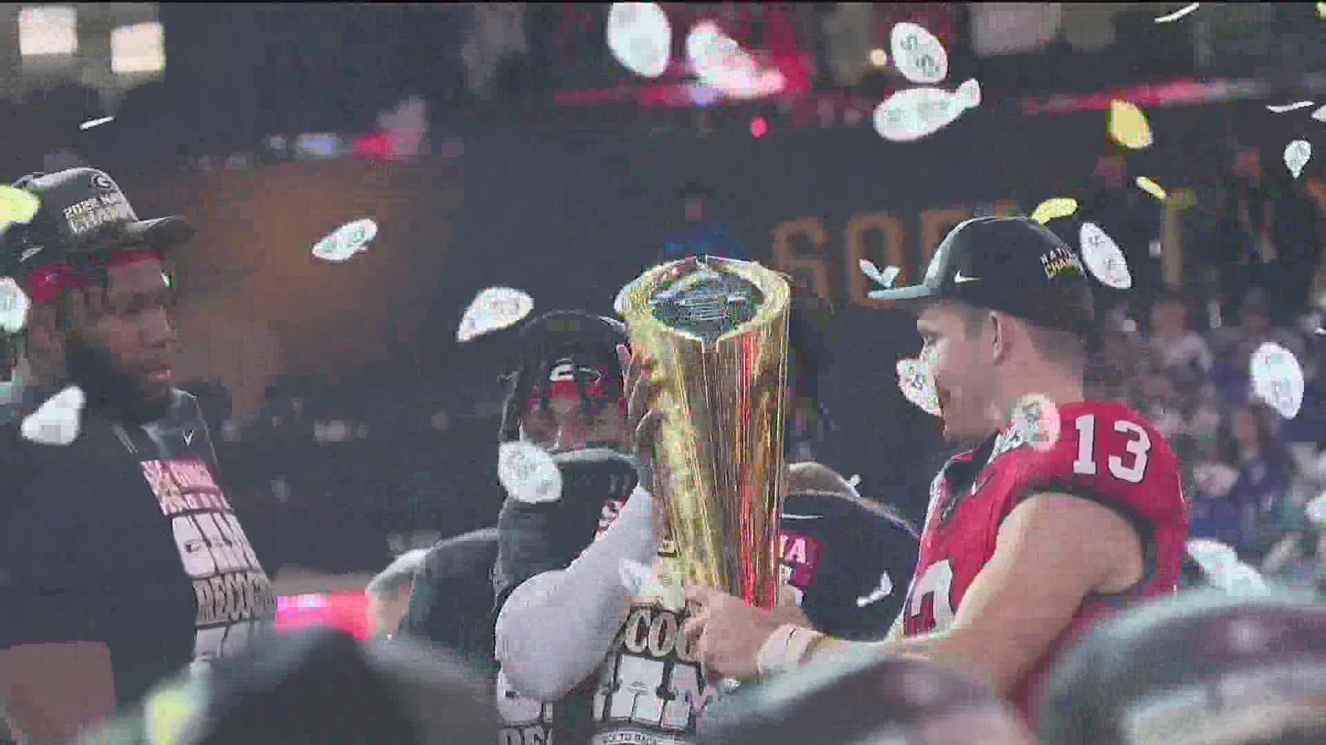 Georgia fans gathered in Athens on Saturday to see players and floats pass by as they celebrated the Bulldog's national Championship win.